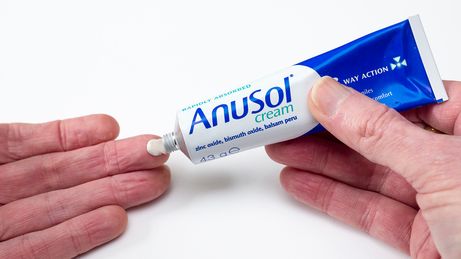 Anusol Cream squeezed onto fingertips
