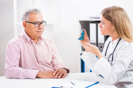 Doctor diagnosing asthma