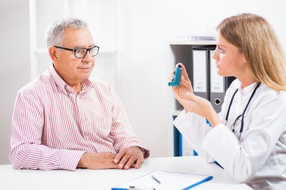 Doctor diagnosing asthma